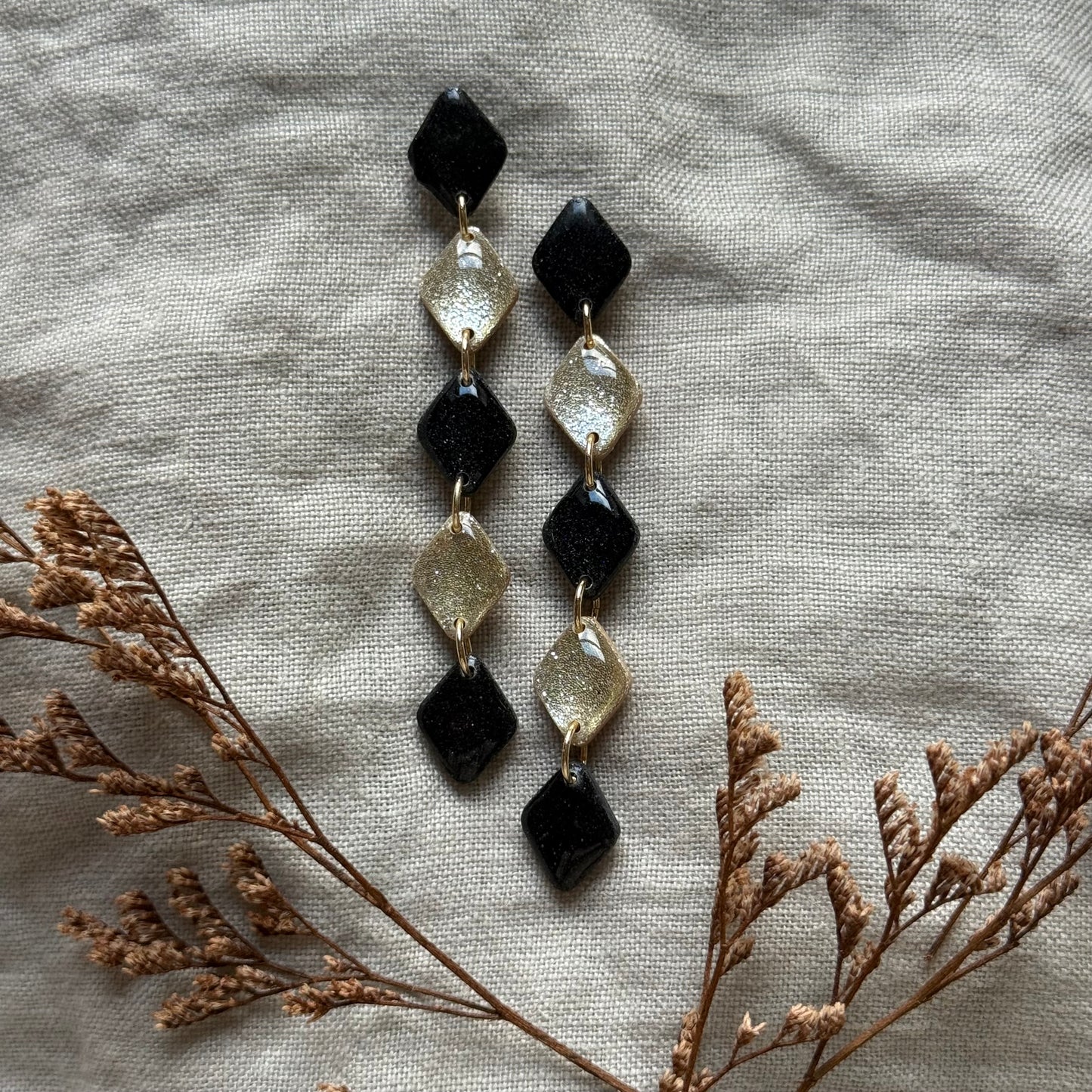 medb | black & champagne glitter