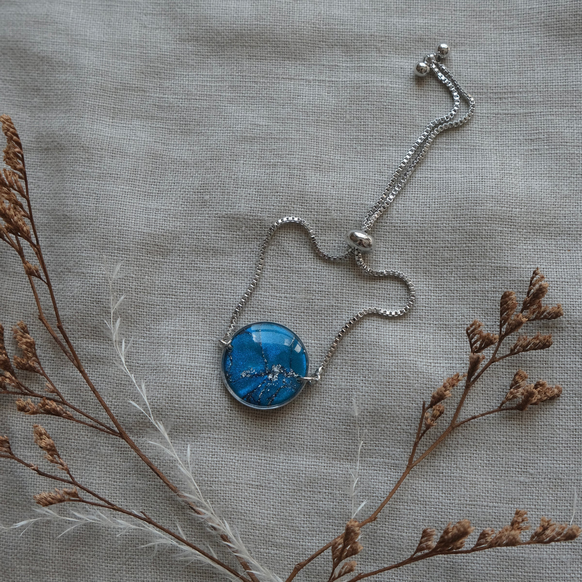 síofra bracelet | peacock blue + silver