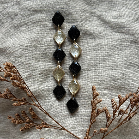 medb | black & champagne glitter