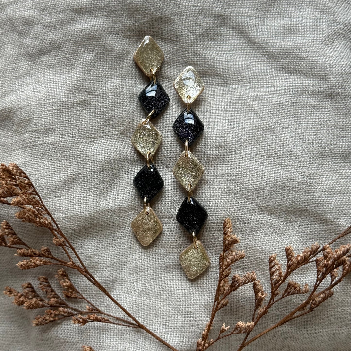 medb | champagne & black glitter