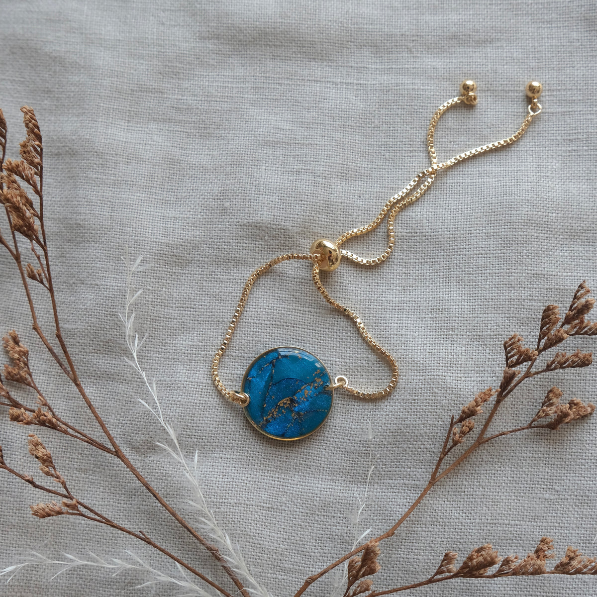 síofra bracelet | peacock blue + gold